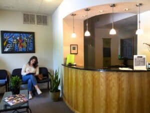 new chiropractic patient filling out forms