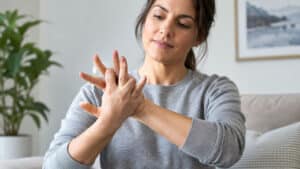 Woman cracking her knuckles